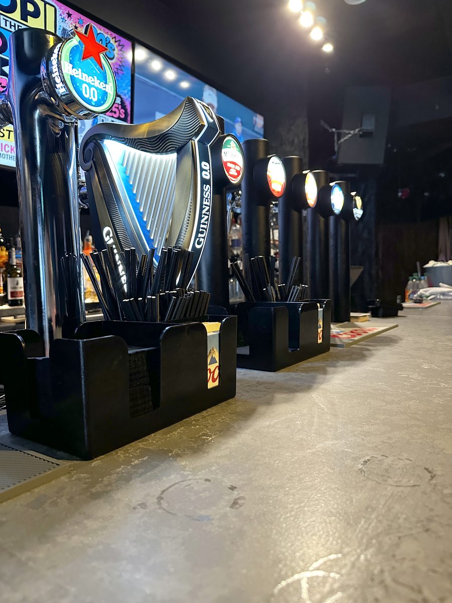 Guinness and draught taps on the bar